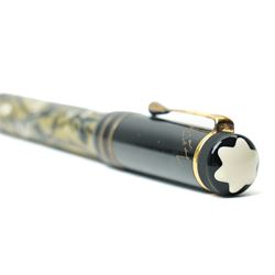 Montblanc Meisterstück Oscar Wilde limited edition fountain pen, black resin cap and barrel with marbled ivory and black patterned lower barrel and gold-plated fittings, the cap signed with Oscar Wilde facsimile and surmounted by the white star emblem, fitted with a medium 18K (750) gold nib engraved 4810, 1994 and MONTBLANC, model no. 28616, presented in original lined fitted case in the form of a book with outer box