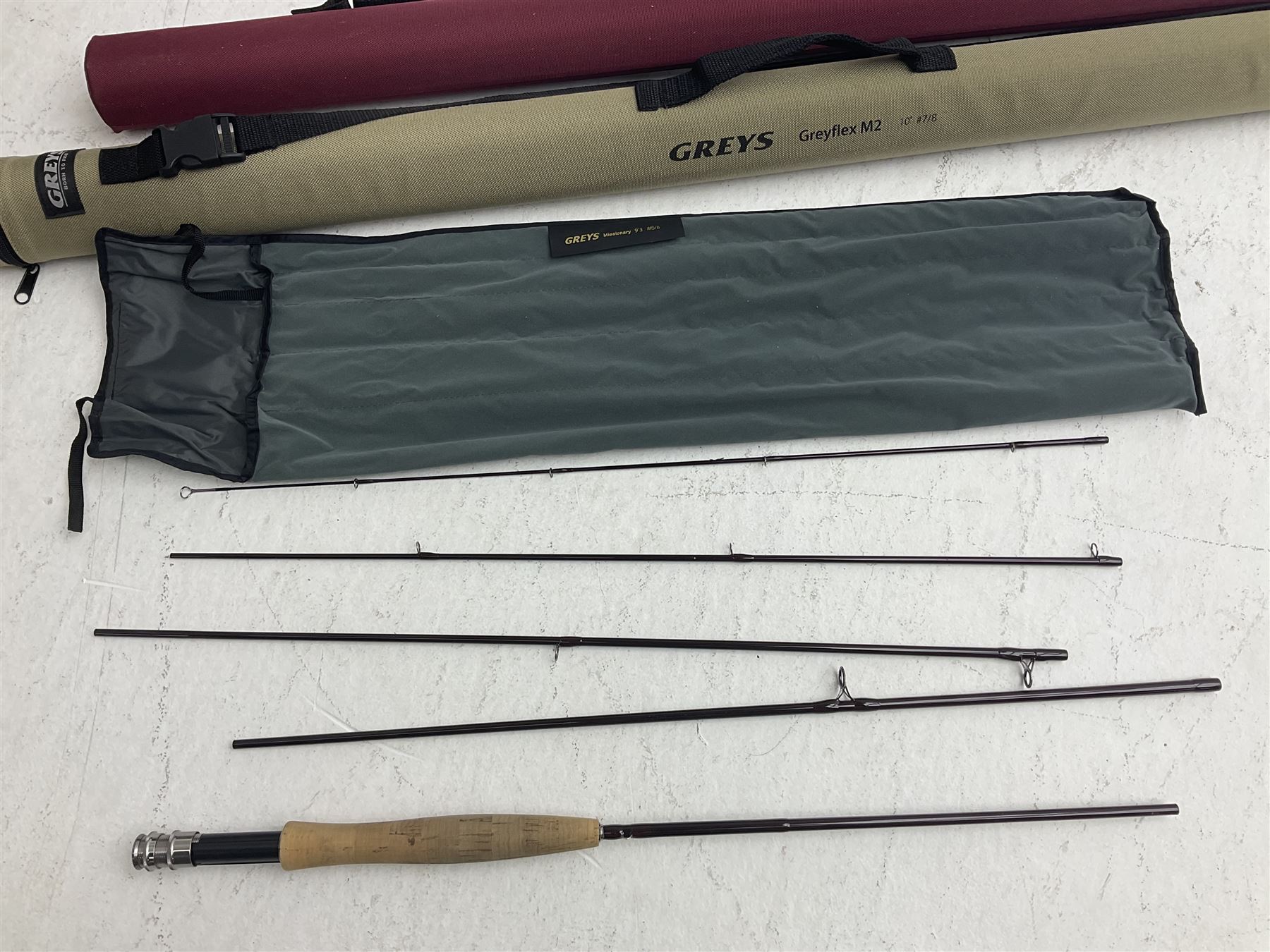 Five fly fishing rods, to include Greys Greyflex M2, Greys Missionary 9'3 etc, together with fly reel, flies, Wychwood fishing bag and various fishing other tackle items 