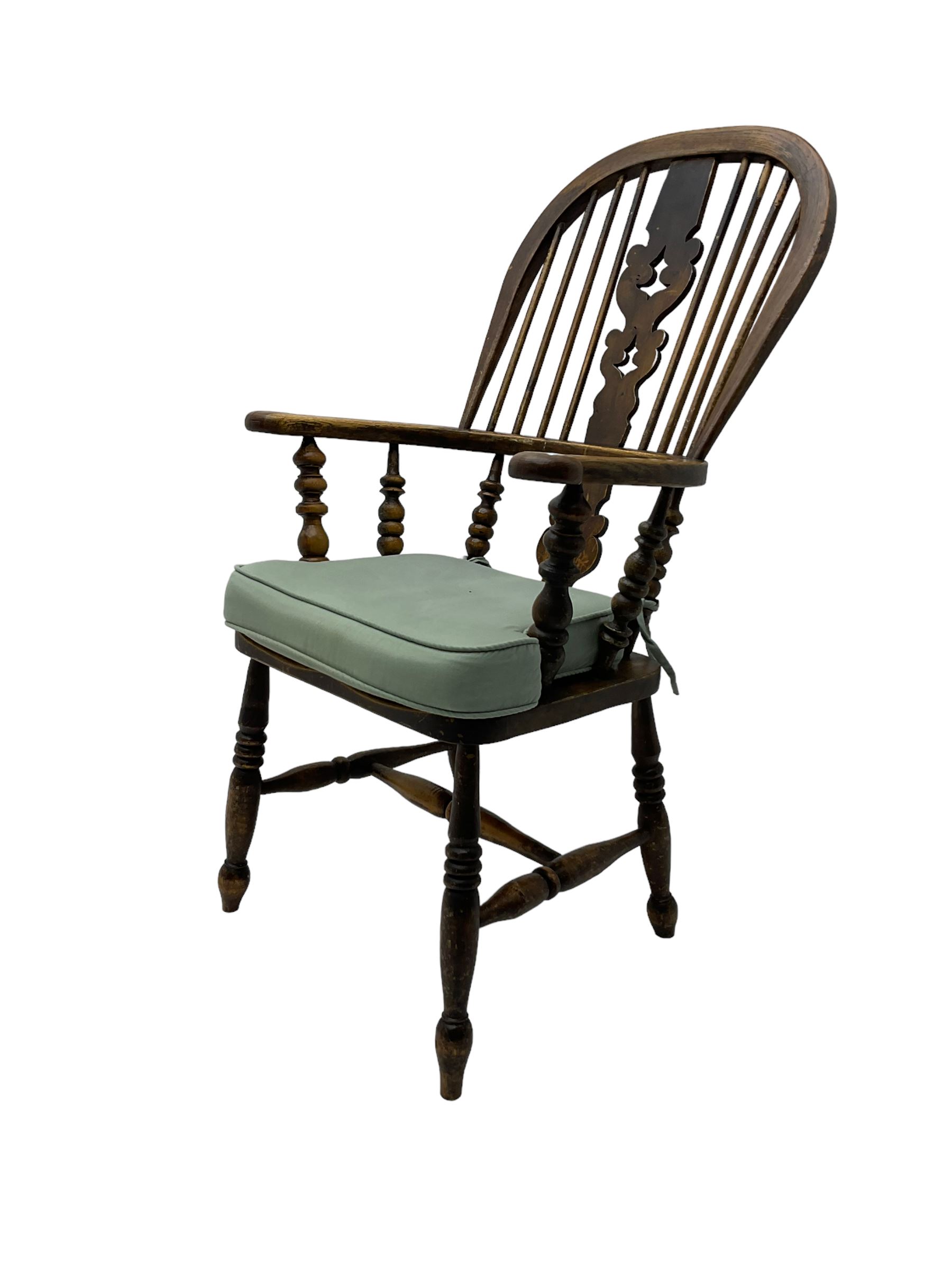 Late 19th century Yorkshire Windsor armchair, high stick back with pierced and fretwork splat, turned supports joined by H-stretcher