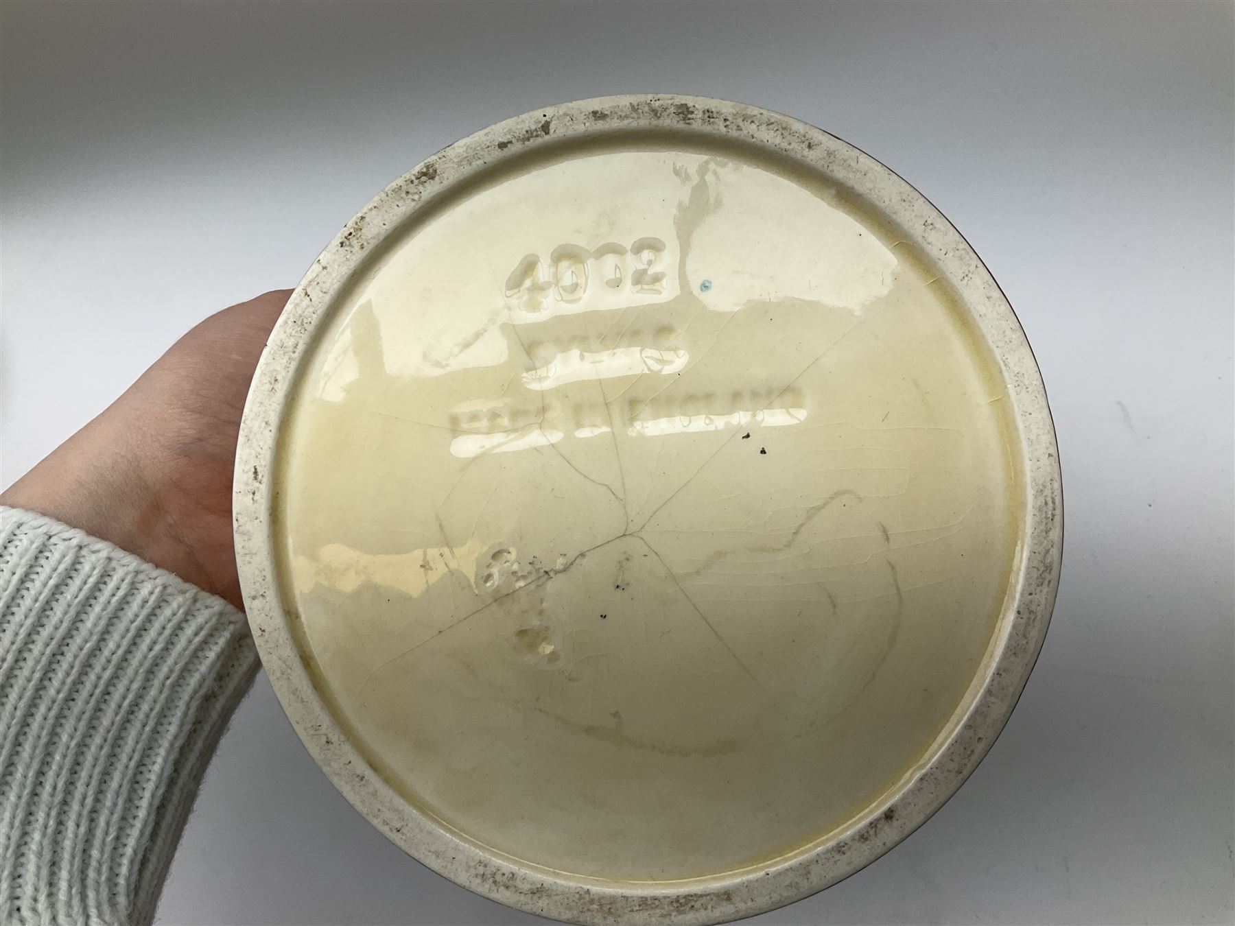 Two Royal Crown Derby pattern Imari soup bowls, pattern 2451, Belleek Fermanagh Ireland four piece set in green shamrock pattern, Royal Doulton small lady figure, Marie HN1370, large Wedgwood fruit bowl, Sylvac jardiniere in autumn leaves pattern, five pieces Co-operative Society commemorative ceramics, with selection of other ceramics. 