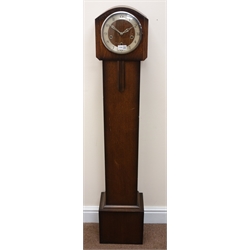  Early 20th century oak serpentine top grandmother clock, twin train movement striking the half hours on a gong, H125cm   