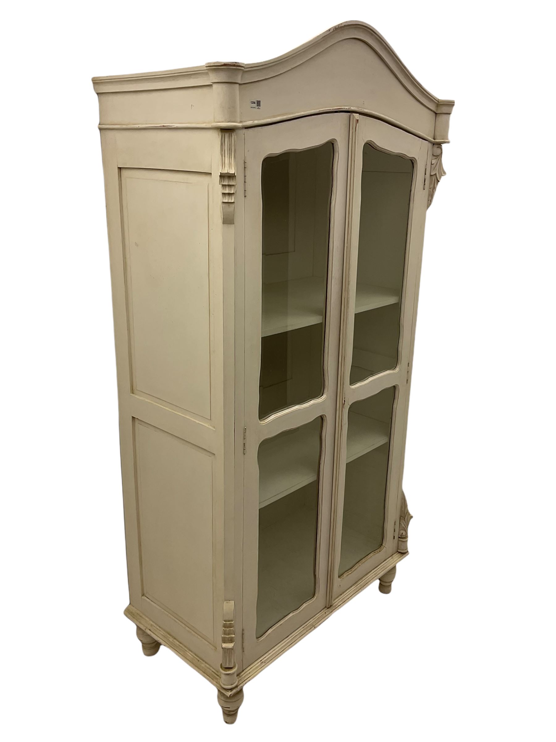 French white painted armoire cabinet, fitted with two glazed display doors