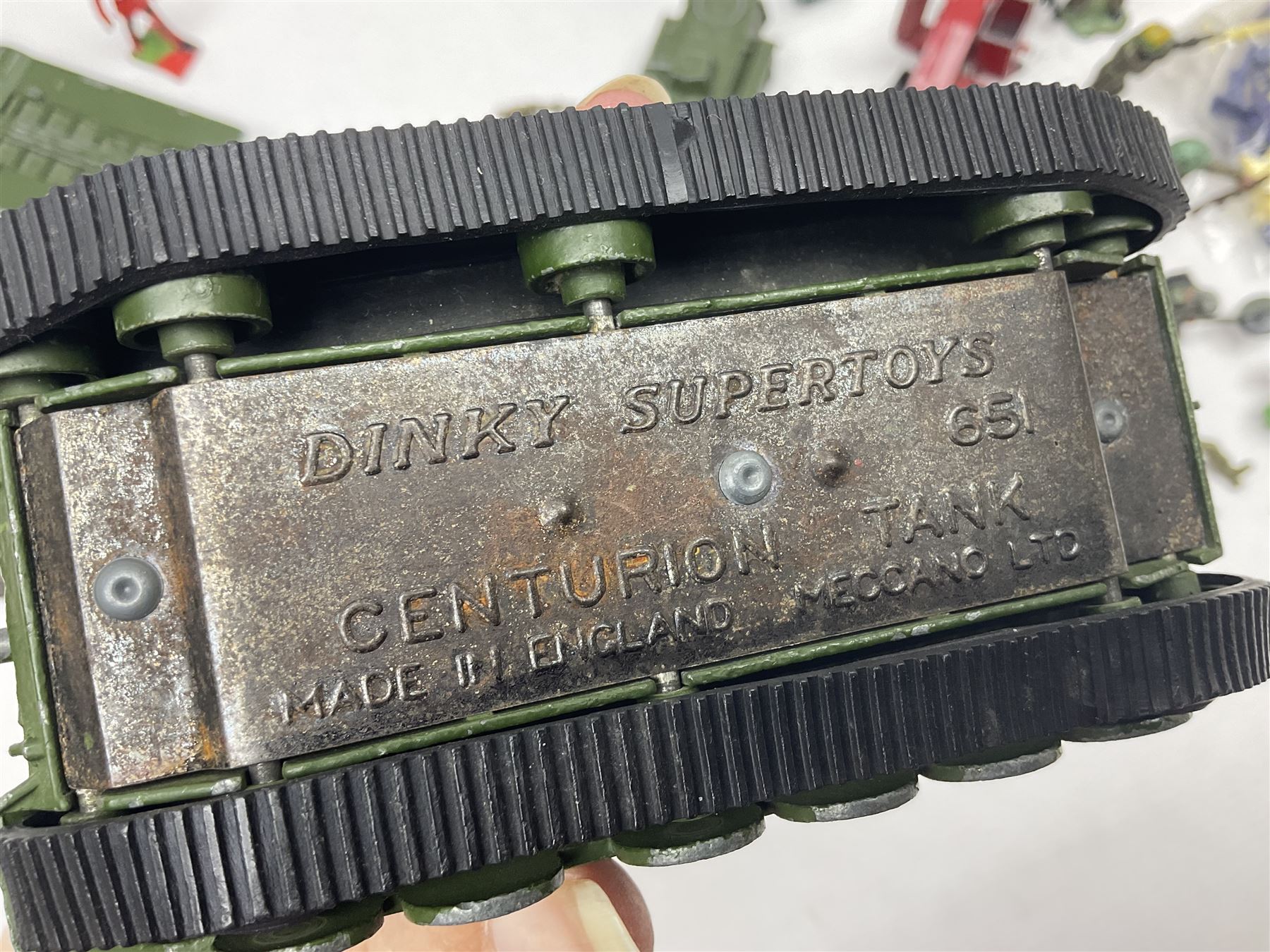 Various makers - unboxed and playworn die-cast models including Dinky Thornycroft Mighty Antar Tank Transporter No.660 and Centurion Tank No.651, other military and farm vehicles; and quantity of loose plastic soldiers and other figures by Crescent, Britains etc