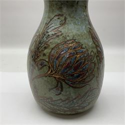 John Egerton (c1945-): studio pottery stoneware vase, decorated with artichoke hearts upon a mottled blue ground, H21cm