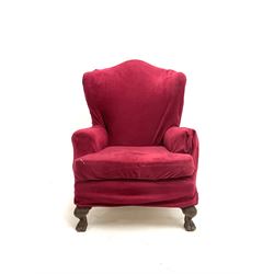 Georgian style wing back upholstered armchair, acanthus carved cabriole hairy paw feet