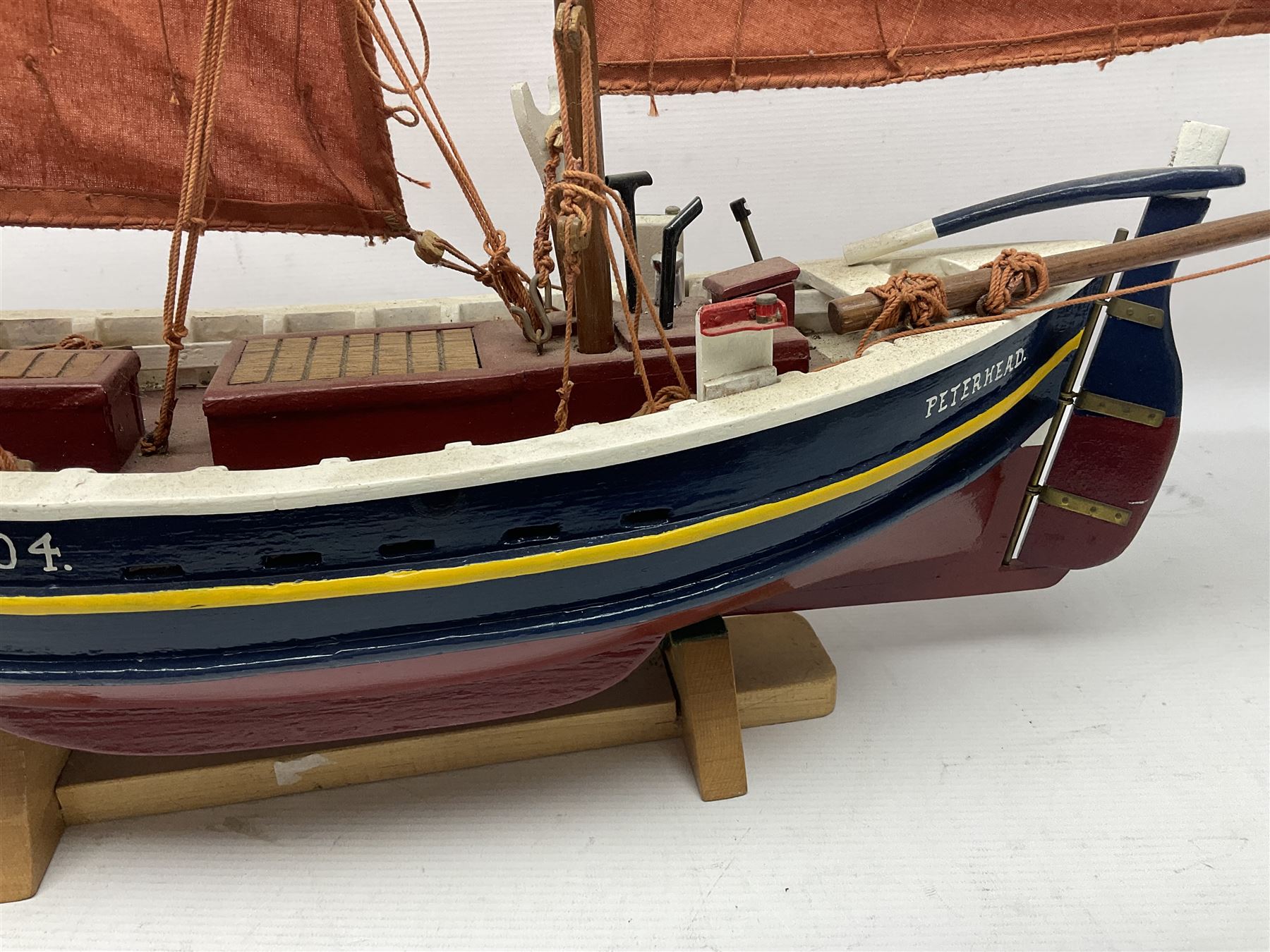 Wooden model of the Peterhead Herring Fishing Boat, Love Divine, PD404. on stand together with Wick Herring Fishing Boat, Galilee WK.1. on stand, L105cm, H64cm