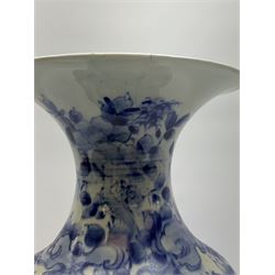 Oriental blue and white vase, of slender ovoid form with waisted neck and flared rim, decorated with cranes by waters edge and further detailed with flowers, H38.5cm