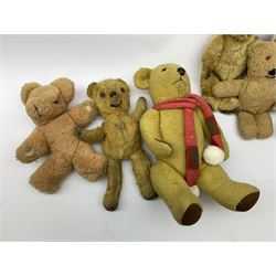Seven English teddy bears 1950s-60s including Pedigree bear with swivel jointed head, plastic eyes and vertically stitched nose and mouth and jointed limbs with velvet paw pads H15