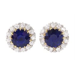 Pair of gold and platinum sapphire and diamond circular cluster stud earrings, total sapphire weight approx 1.20 carat