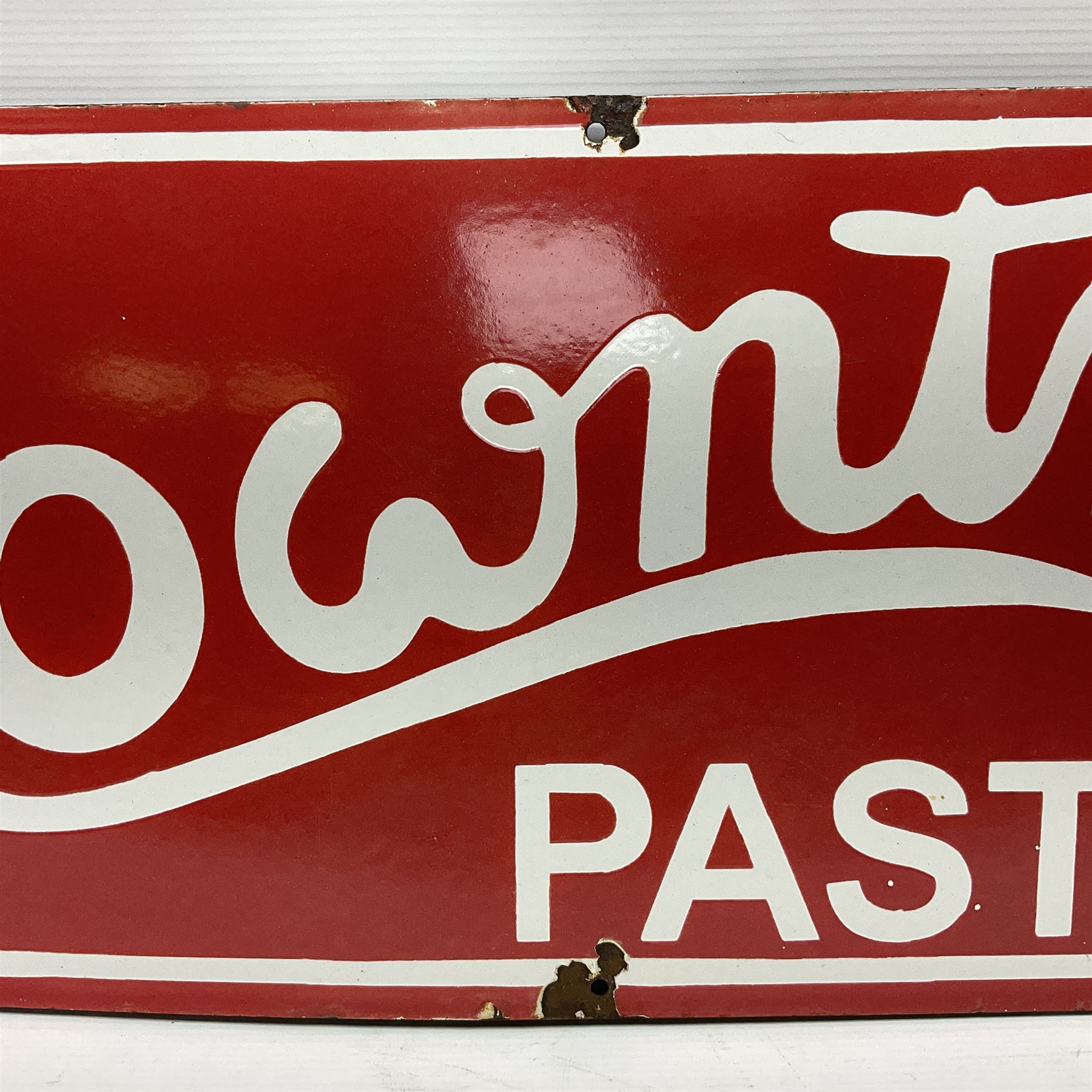 Rowntree's enamel advertising sign, 'Rowntree's Pastilles' white writing on a red ground, H30cm, L92cm