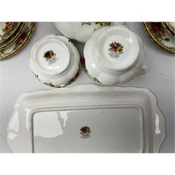 Royal Albert Old Country Roses pattern tea service, comprising teapot, milk jug, open sucrier, three teacups, six saucers, six dessert plates, cake plate and rectangular serving dish, mostly seconds (20)