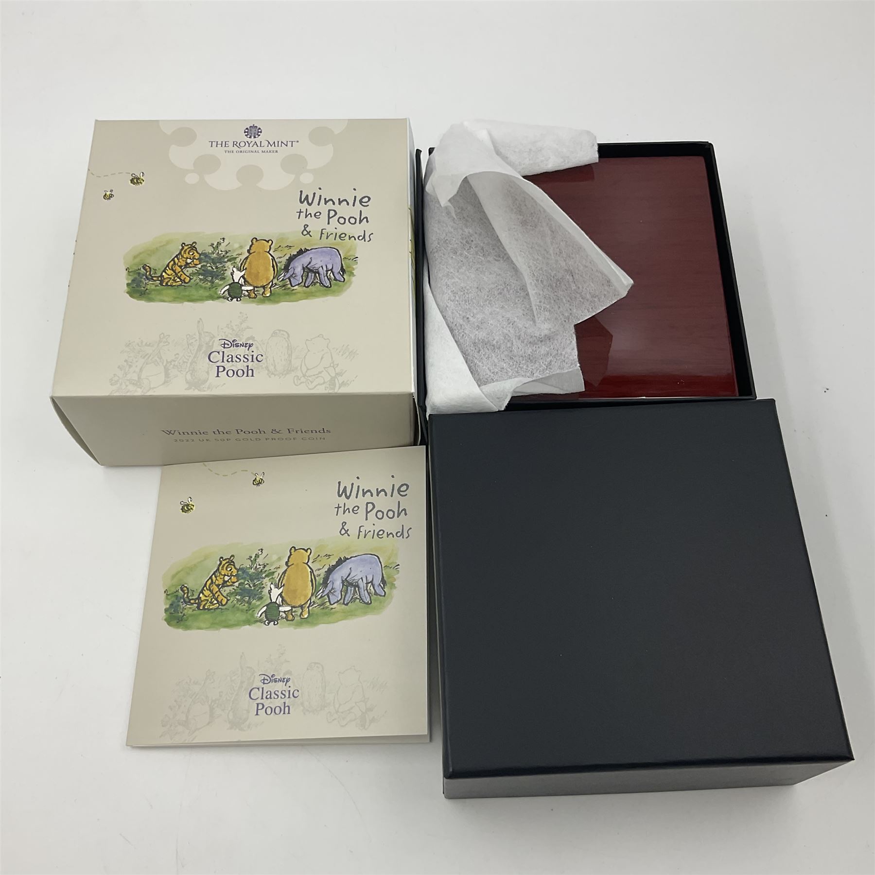 The Royal Mint United Kingdom 2022 'Winnie the Pooh and Friends' gold proof fifty pence coin, cased with certificate