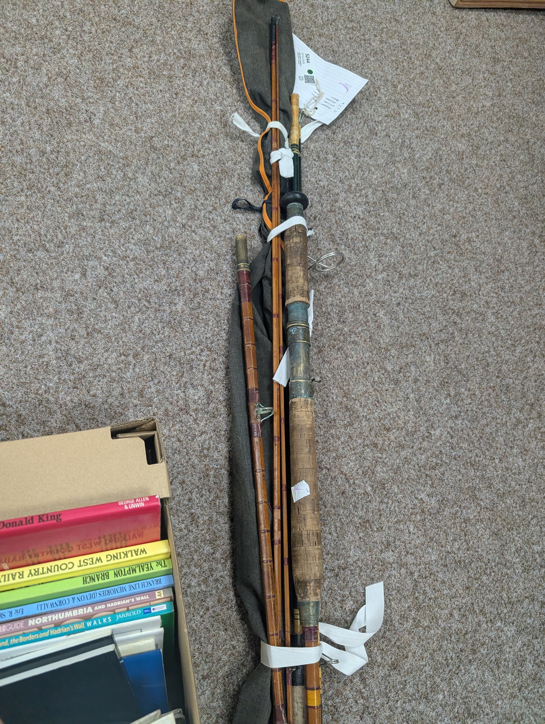 Fishing rods including split cane, fly and The Midlander example, together with a collection of railway reference books and maps including Ordnance Survey
