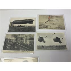 Collection of twenty six postcards depicting Airships/Zeppelins, including two pairs depicting the tragedy of the R.38. wrecked over Hull August 24th 1992, many unused.