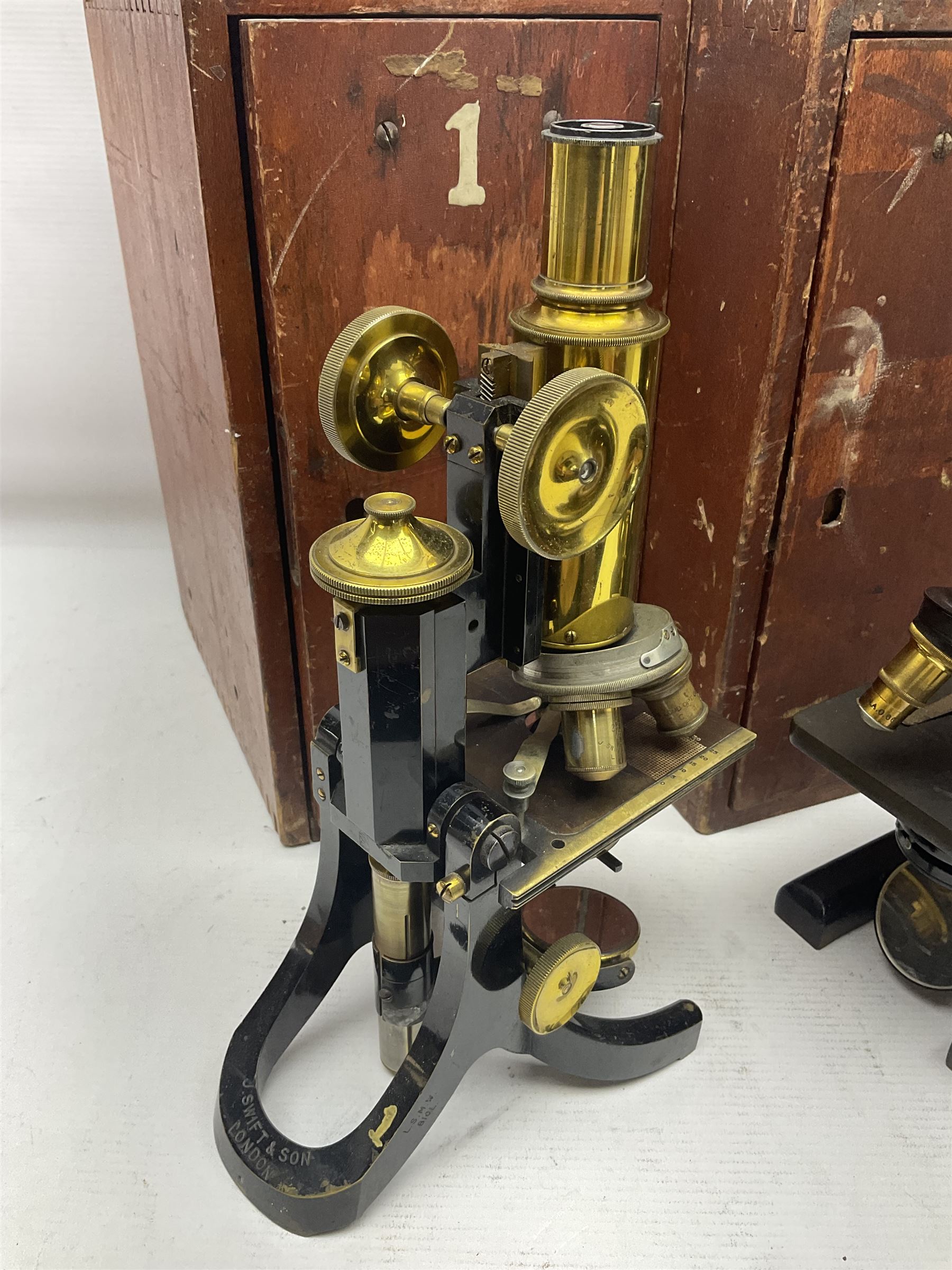 Three boxed microscopes, comprising Hawkslay & Sons Spencer Buffalo microscope no 68177, J Swift & Son microscope and R & J Back microscope no 30241