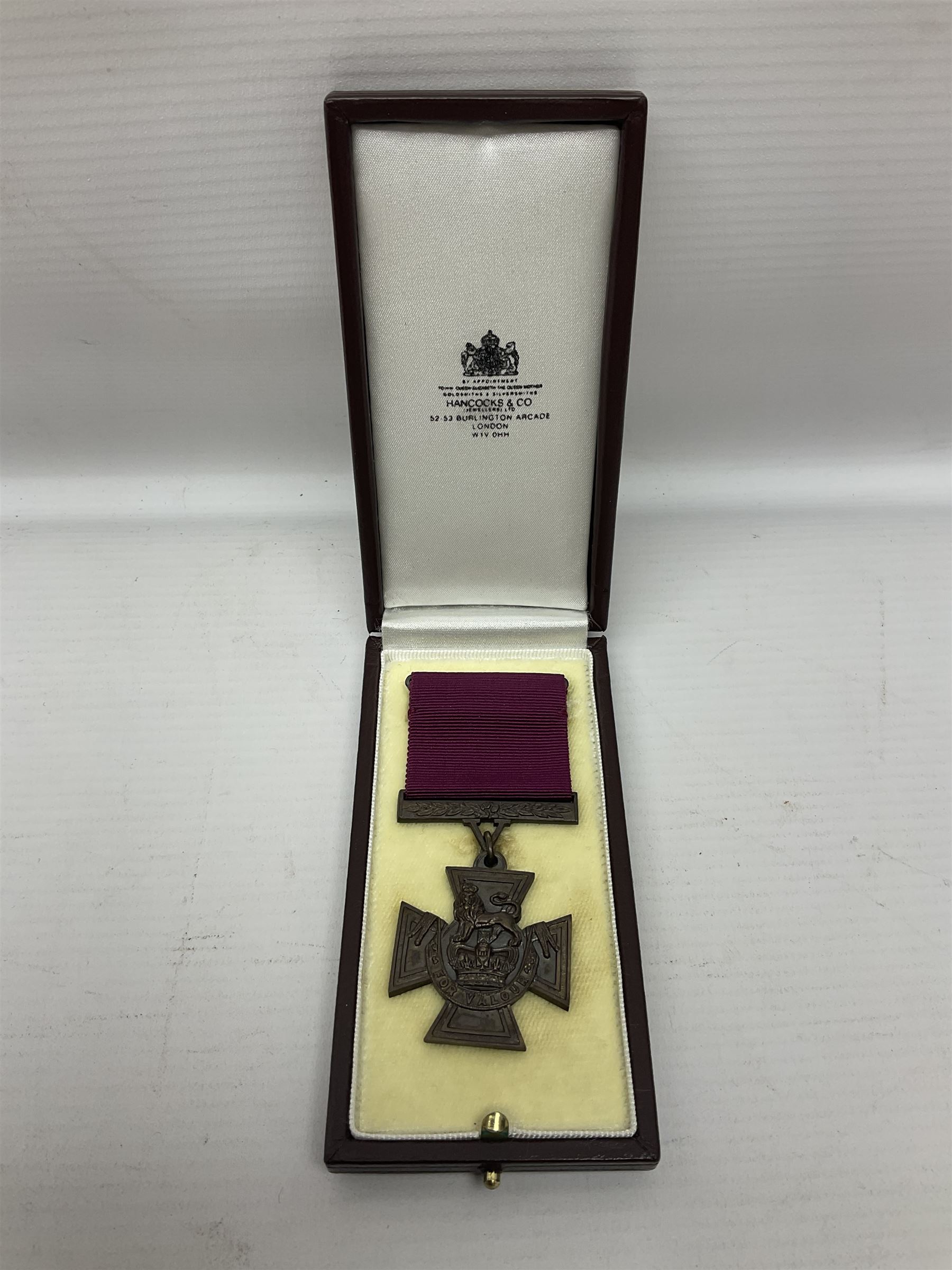 Victoria Cross, an official Hancocks & Co, London replica, the reverse engraved 'Hancocks 36', in fitted leather case of issue; Auctioneer's Note: The Victoria Cross was instituted on 29th January 1856, with the first awards backdated to 1854, and in the first 150 years of its existence was awarded on 1,355 occasions (1,352 Crosses and 3 Second Award Bars). To mark the 150th Anniversary, the London jewellers Hancocks, who have manufactured every Victoria Cross ever awarded, issued a limited edition replica, the replicas all individually numbered on the reverse, with the edition limited to 1,352 replica crosses. The No.36 apparently relates to actions by Capt. A. Henry of the Land Trans Corps at Inkerman 5/11/54 reported in the London Gazette 24/02/57.