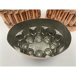 Five Victorian copper jelly mould, largest H10cm, L16cm