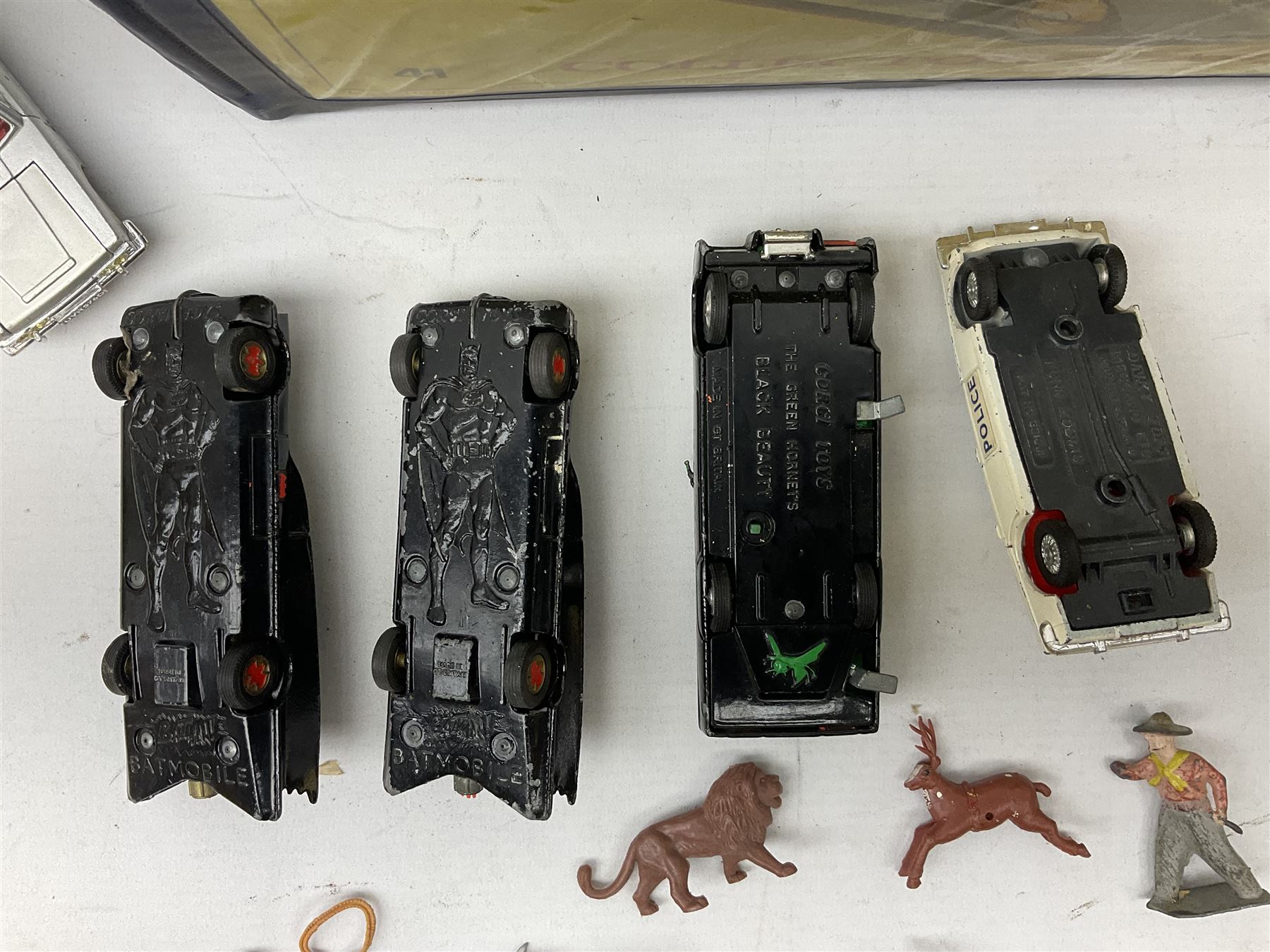 Unboxed and playworn die-cast models of TV/Film interest by Corgi including Green Hornets Black Beauty, two Batmobiles, James Bond Aston Martin DB5, Saints Volvo P1800 etc; two Matchbox 1-75 Series Collector's Cases including various playworn models; and quantity of playworn lead and plastic figures by Britains etc