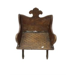 Late 20th century stained beech boarded plank chair, decorated with carved floral and geometric patterns
