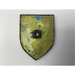 Henry George Murphy (1884-1939), Arts & Crafts enamel panel, of shield form, decorated with a red cross, upon a white ground, with a central flower, H7cm, W6cm