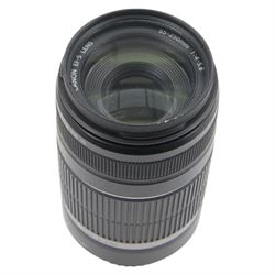 Four Canon camera lenses, comprising EF 50mm 1:1.8 lens serial no. 70896512, boxed, two zoom EF-S 18-55mm 1:3.5-5.6 IS lenses serial nos. 2040537810 and 6462009965 and an EF-S 55-250mm 1:4-5.6 lens serial no. 67007517