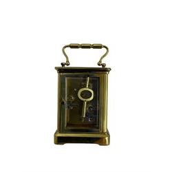 French - 19th century 8-day carriage clock with alarm, corniche case with an enamel dial, Roman numerals, minute markers and alarm setting disc, with a cylinder platform escapement, sounding the alarm on a bell. With key.