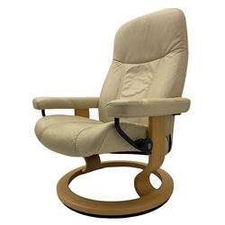 Ekornes - Stressless armchair upholstered in cream leather with matching footstool 
