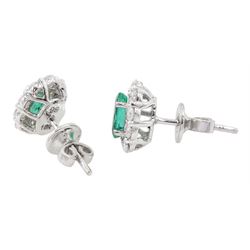 18ct white gold oval cut emerald and round brilliant cut diamond cluster stud earrings, stamped, total emerald weight approx 1.00 carat, total diamond weight approx 0.55 carat