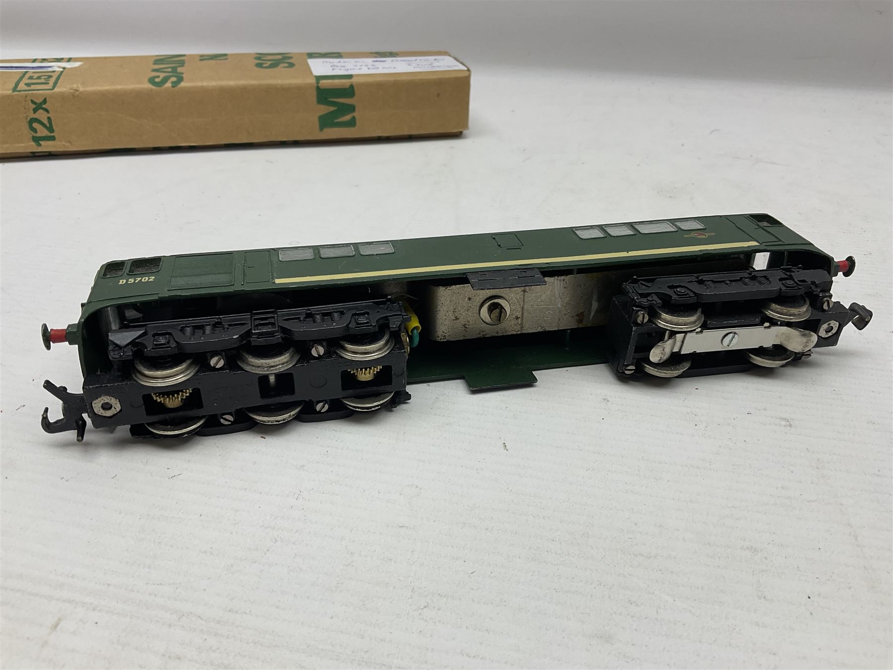 Hornby Dublo - 2-rail - Class 8F 2-8-0 locomotive No.48109 in BR black; Class R1 0-6-0 tank locomotive No.31337 in BR black; and Met-Vic Diesel Co-Bo locomotive No.D5702 in BR green; together with 3-rail Class 4MT Standard Tank 2-6-4 locomotive No.80054 in BR black; three unassociated boxes and one unboxed (4)
