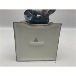 Lladro figure, Justice, modelled as a judge sat in a char, sculpted by Salvador Furió, with original box, no 5489, year issued 1988, year retired 1993, H34cm 