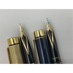 Sheaffer Targa 1011 Diamond Square fountain pen, the gold plated barrel with nib stamped 14K 585, together with another Sheaffer Targa fountain pen with blue barrel and gold nib stamped 14K 585 and matching ballpoint, and Sheaffer ballpoint pen with sterling silver barrel, largest L13.5cm (4)