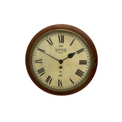 A round dial wall clock with a 15” mahogany bezel and 12” painted dial, with Roman numerals, minute track and streel spade hands, dial inscribed “ AM Smiths, 8 Day, 1941”, with a flat glass and brass bezel, dial pinned to a single train fusee movement. With pendulum.
