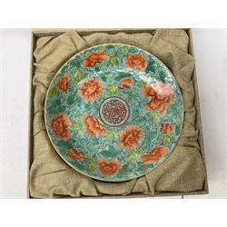 Three Chinese polychrome enamel plates each decorated with floral decoration, all marked beneath, D21cm 