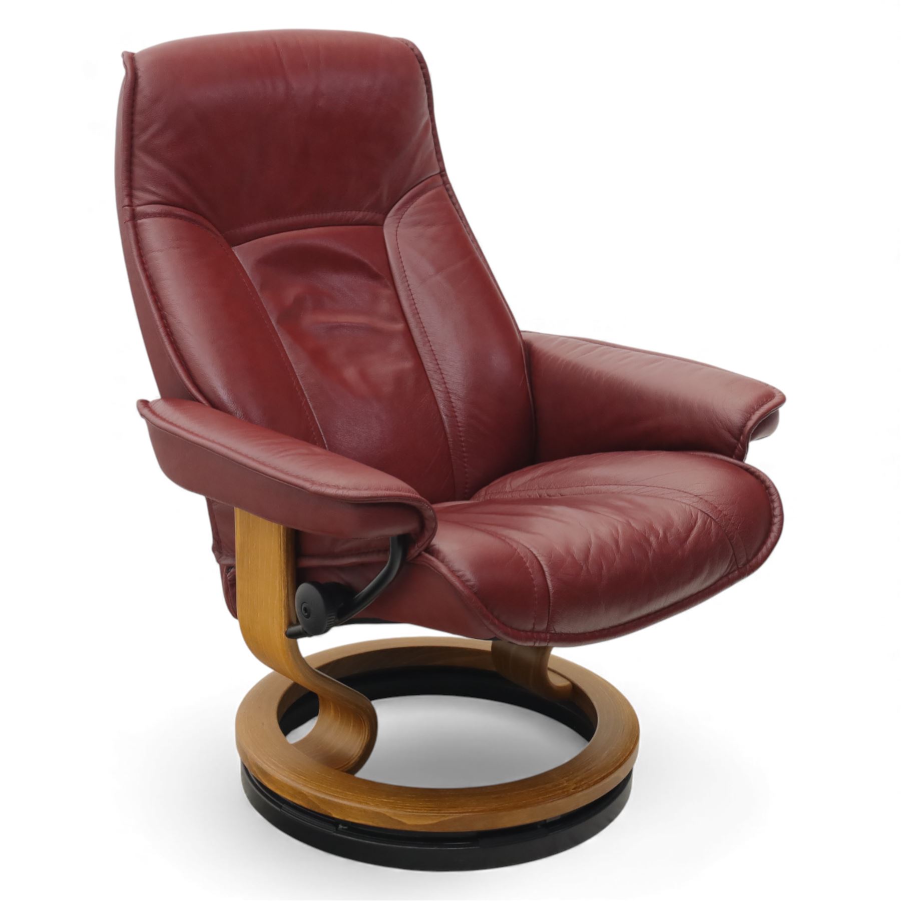 Ekornes - 'Stressless' maroon leather reclining swivel armchair, with high padded back and panel-stitched upholstery, shaped armrests, on a circular laminated wood swivel base