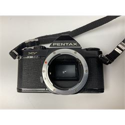 Four Minolta camera bodies, to include Dynax 500si, serial no. 94812651 with 'Signa Zoom 1;3.5-4.5 f=28-70mm' lens, Maxxum 300si, serial no. 97821665, with 'Tamron AF 80-210mm' lens and Dynax 300si, serial no 01603265'  with Minolta AF Power Zoom 35-80mm 1;4' lens, etc, together with Pantax MV1 camera bodies and other camera equipment 