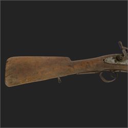 Middle Eastern percussion cap rifle, the 107cm  barrel with four brass bands and ramrod under, overall L143cm, together with another percussion rifle the 106cm barrel a copy of a 17th century Spanish barrel, complete with fake stamp, by vendors repute this rifle was confiscated from tribesmen in Kurdistan by police
Sold as an exempt item under Section 58 (2) of the 1968 Firearms Act, to be held as a curiosity or ornament