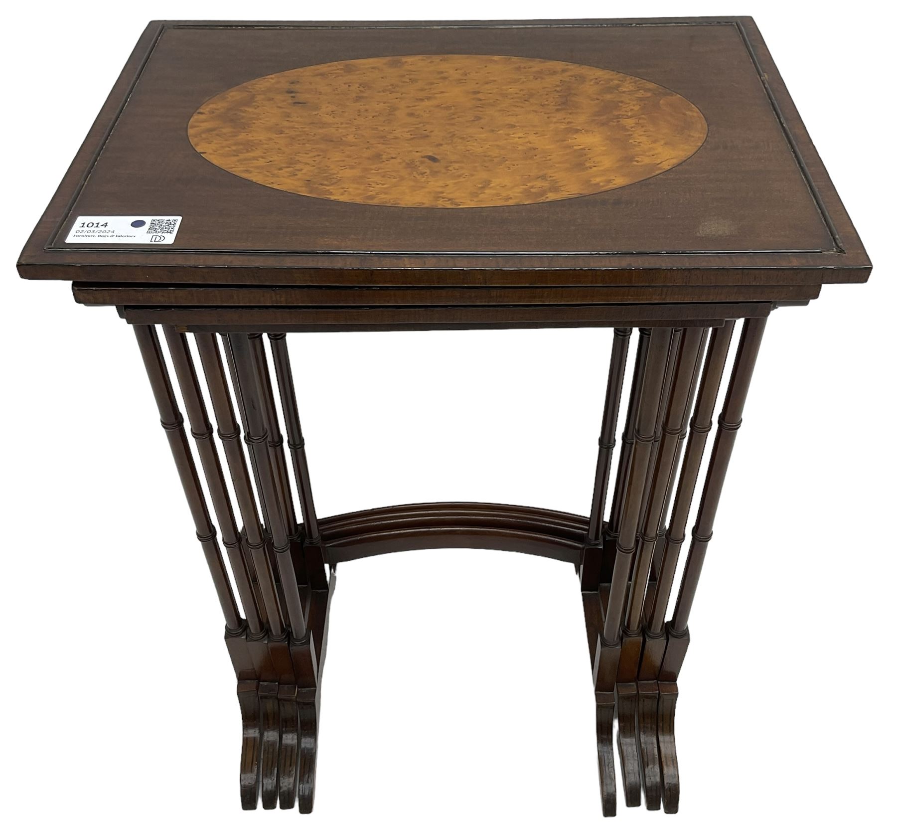 20th century inlaid mahogany quartetto nest of four tables, rectangular top inlaid with birdseye maple oval panel, ring turned supports on sledge feet