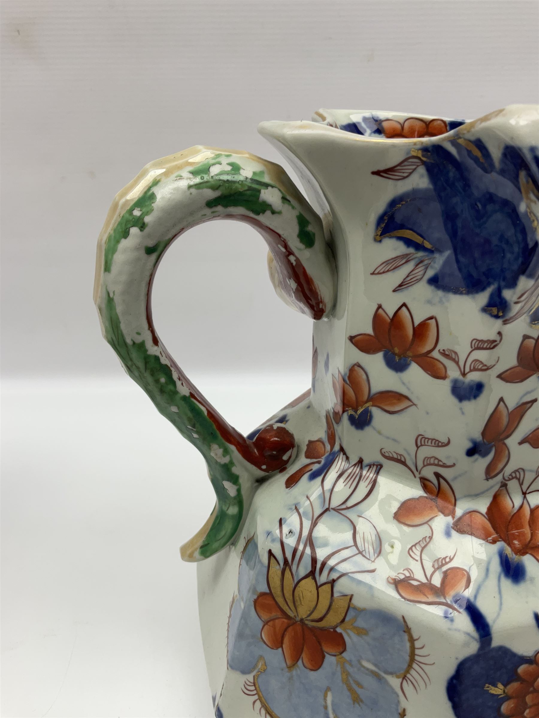 Two Masons Ironstone jugs, each in the Imari palette with serpent handles, with maker's mark beneath, tallest H24cm