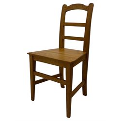 Contemporary light oak farmhouse dining table, and four oak ladder back dining chairs, rectangular top with rounded corners, raised on four turned baluster legs in natural lacquered finish, chairs with three horizontal slats beneath a shaped top rail, solid seat and square section legs united by stretchers