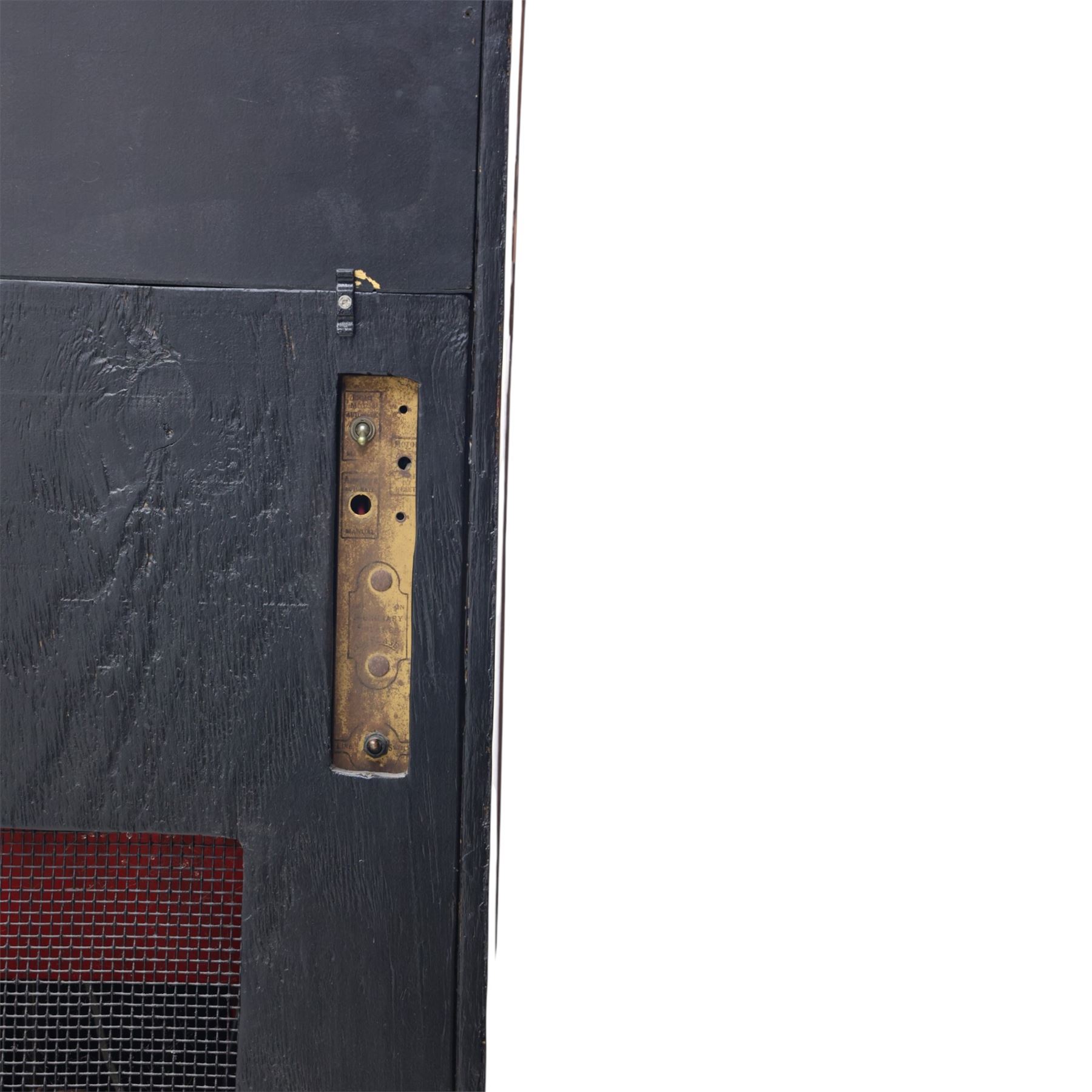 Rudolf Wurlitzer Company - Model 616 'Simplex' 1937 jukebox, figured walnut veneered cabinet with illuminated red and amber side panels enclosed by chromed uprights, glazed upper record compartment, cast Art Deco speaker grille, coin-operated push-button selection panel with circular title index, raised on a moulded base