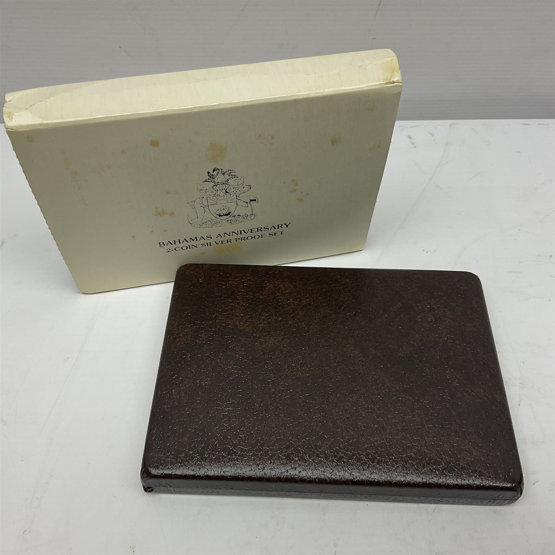 Six Commonwealth of the Bahamas Islands nine coin sets, dated 1972, 1973, 1974, 1975, 1976 and 1979, all minted at the Franklin Mint and containing high denomination silver coins, all cased, and a Bahamas Anniversary 1978 two coin set comprised of two silver proof ten dollar coins, cased 