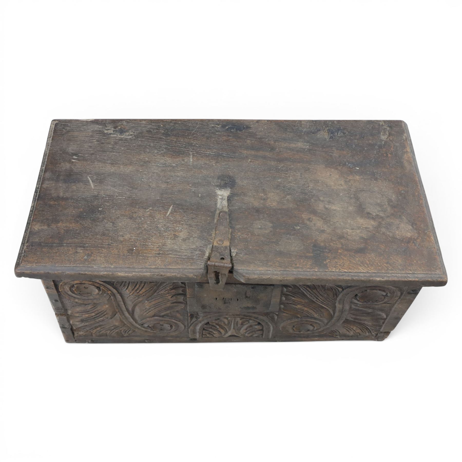 18th century small oak box with carved front, iron strap latch and hinges, fitted candlebox
