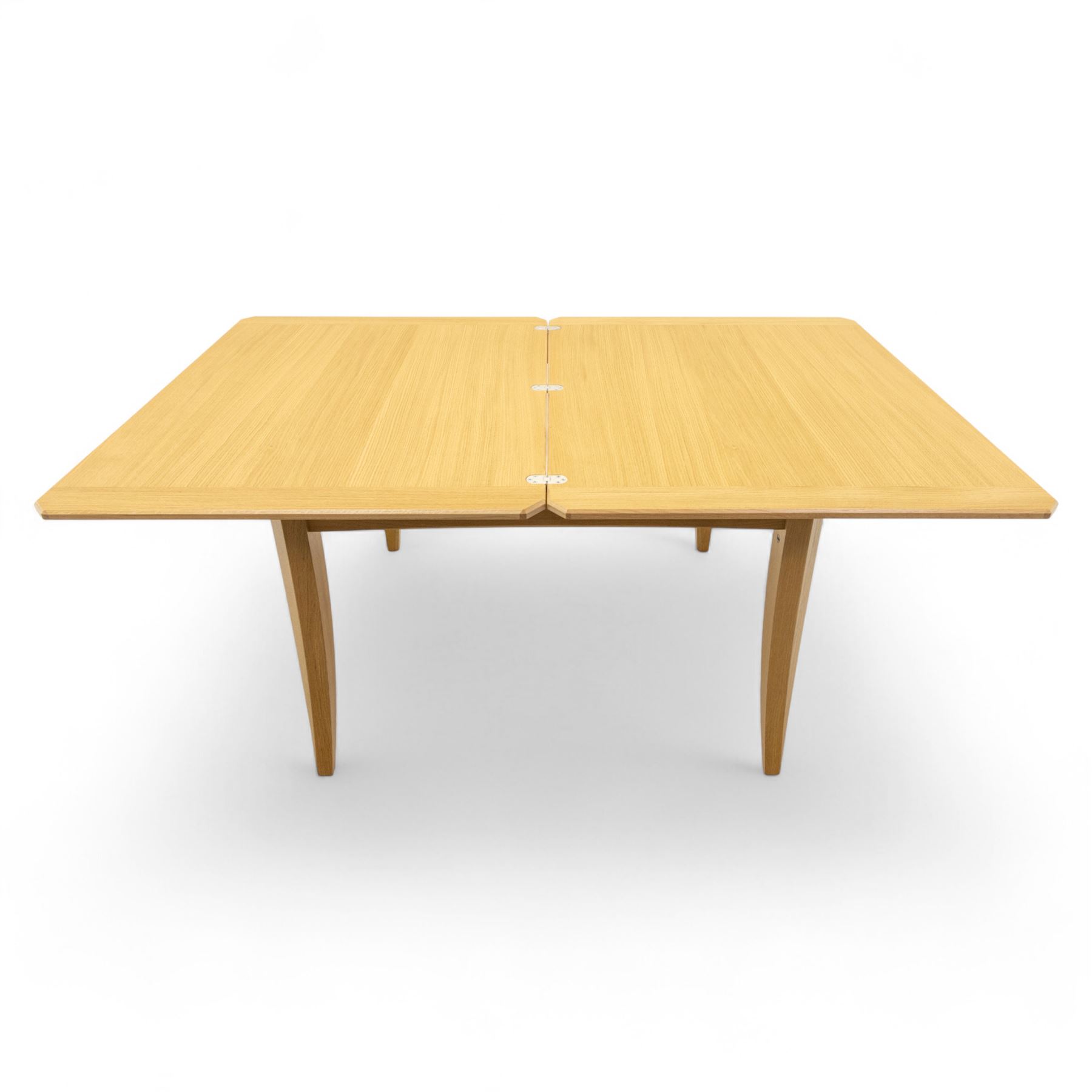 Ercol - light oak ‘Artisan’ rectangular dining table with chamfered top extending fold over top and tapered legs, together with two matching high back dining chairs upholstered in textured beige fabric (Chairs H 98cm, W 47cm, D 52cm)