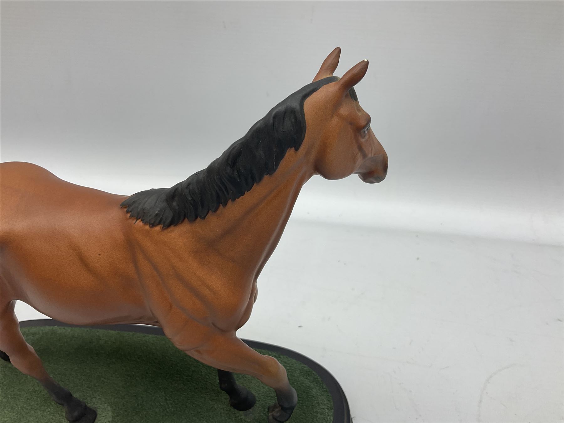 Beswick 'Mill Reef' horse figure, on a wooden plinth together with Beswick Ware horse figure 'Red Rum' on wood plinth, both with printed mark beneath
