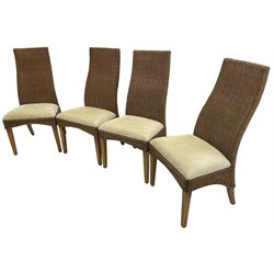 Set of six (4+2) wicker dining chairs, upholstered seat cushions, on square tapering elm supports 