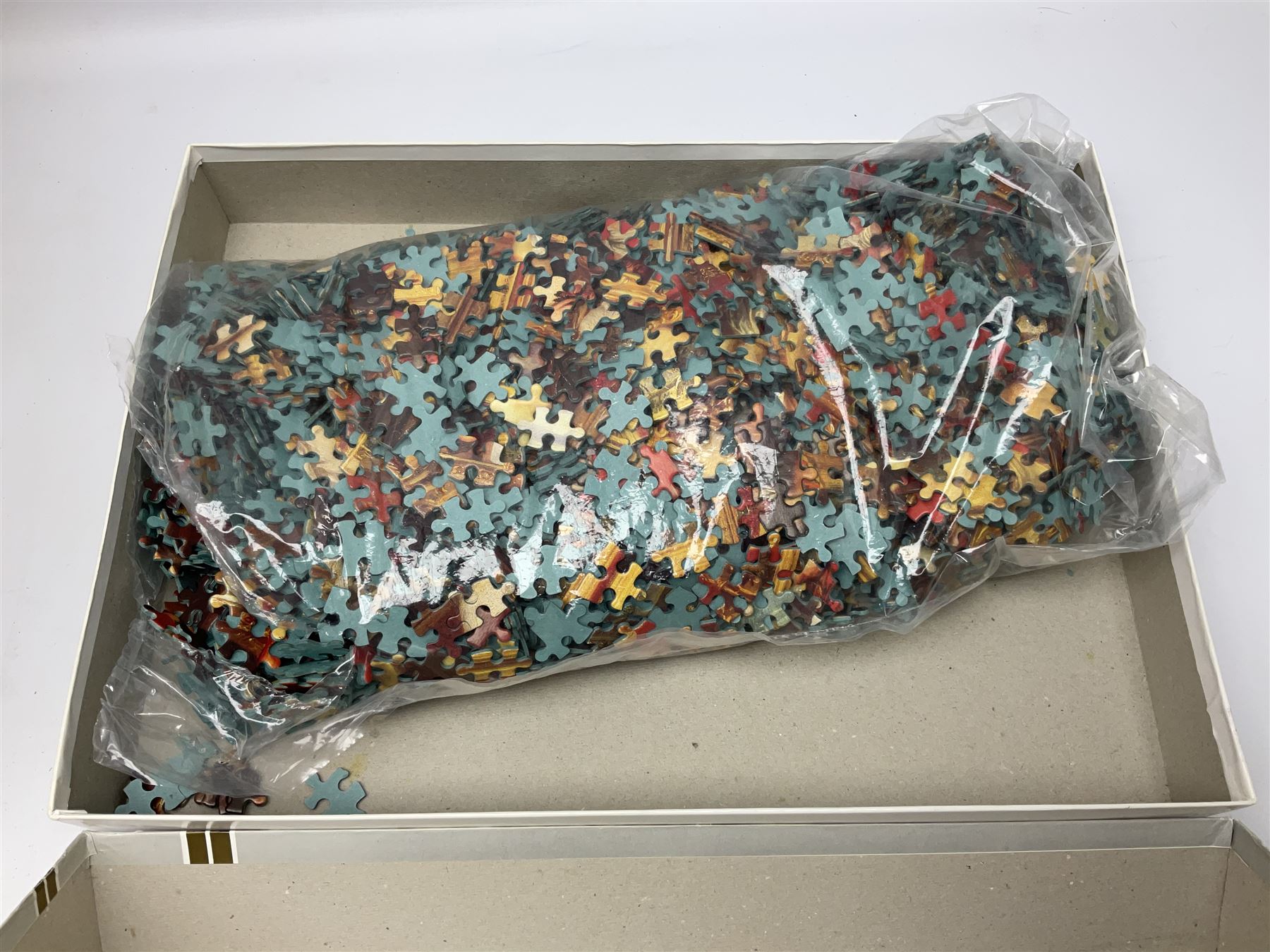 Quantity of boxed jigsaw puzzles