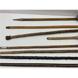 Six walking sticks, to include two hallmarked silver capped examples, together with a  shooting stick