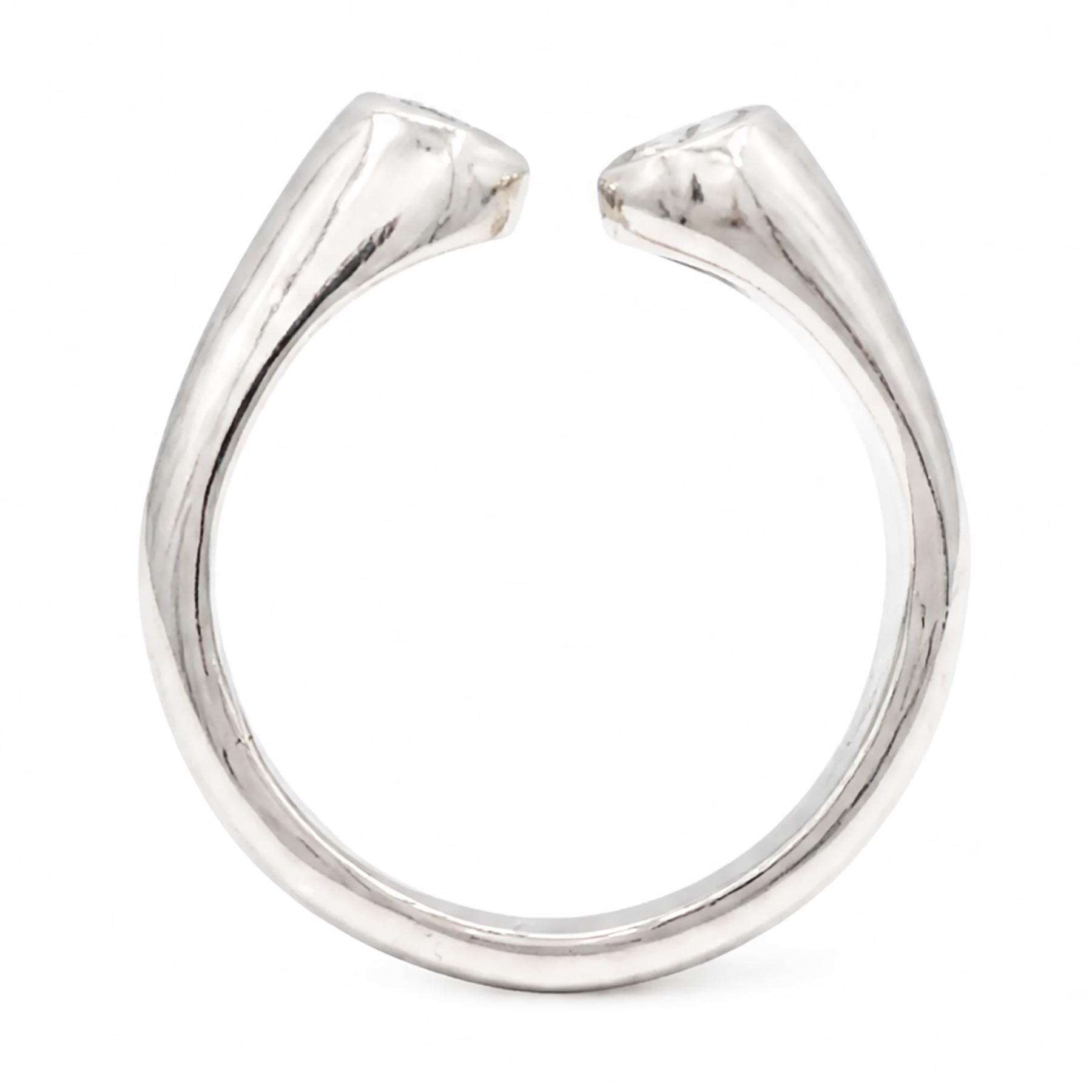 Platinum two stone diamond ring, the two bezel set finials set with a round brilliant cut diamond, Sheffield 1996, total diamond weight approx 0.40 carat