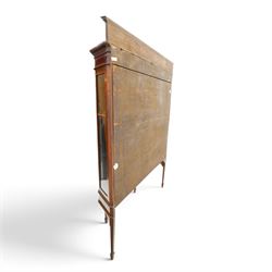 Edwardian inlaid mahogany display cabinet of rectangular canted form, galleried top with crossbanded inlay, above a glazed cabinet enclosing  baize lined shelves, raised on square tapering legs terminating in spade feet  