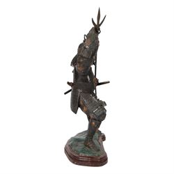 Japanese bronze of a Samurai, possibly Meiji period, standing holding a three pronged spear, on a wave form base, H67cm